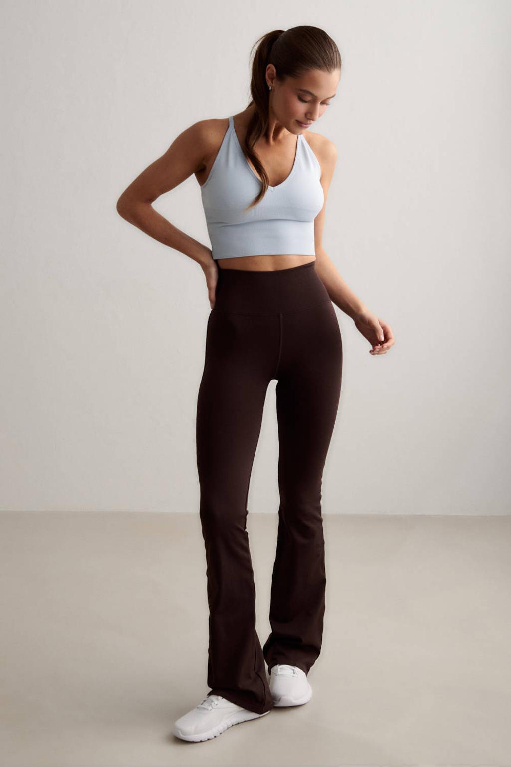 Lichtblauwe dames Aim'n Shape Seamless sporttop van polyester met V-hals