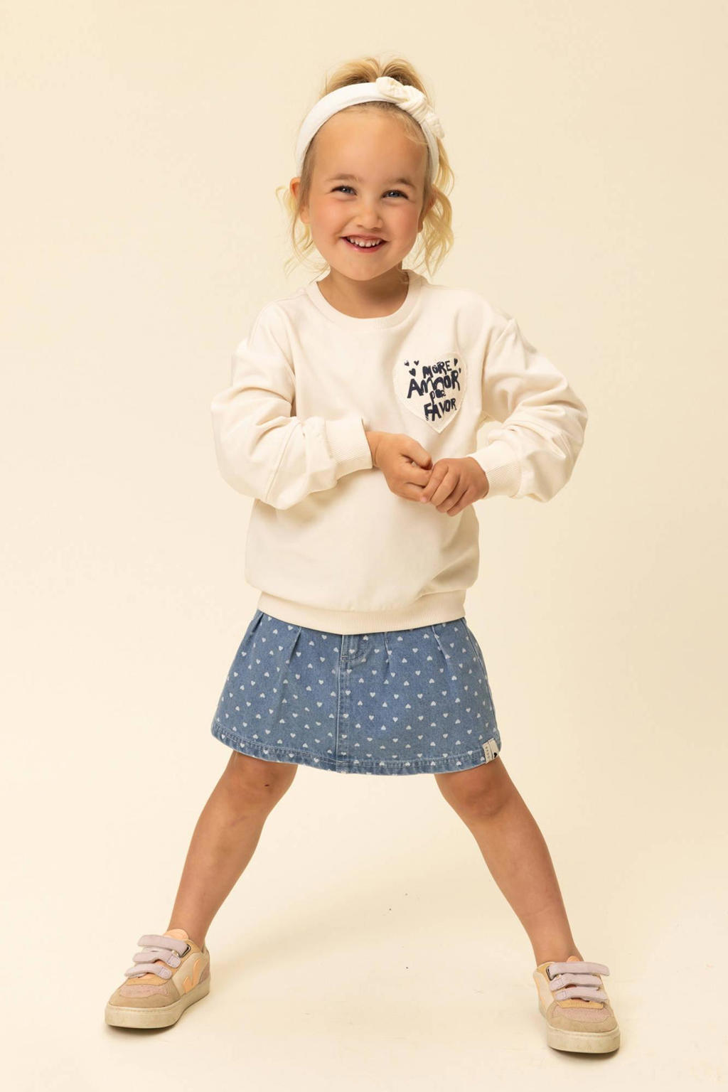 Ecru en donkerblauwe meisjes LOOXS little sweater van stretchkatoen met backprint, lange mouwen, ronde hals en geribde boorden