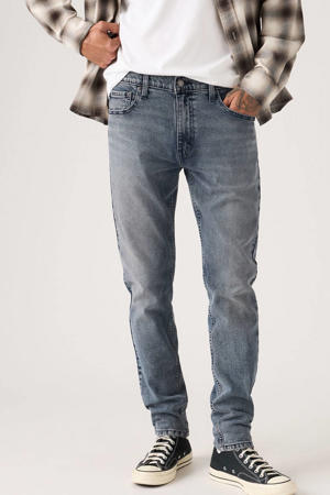 512 slim tapered jeans shrouded in mystery