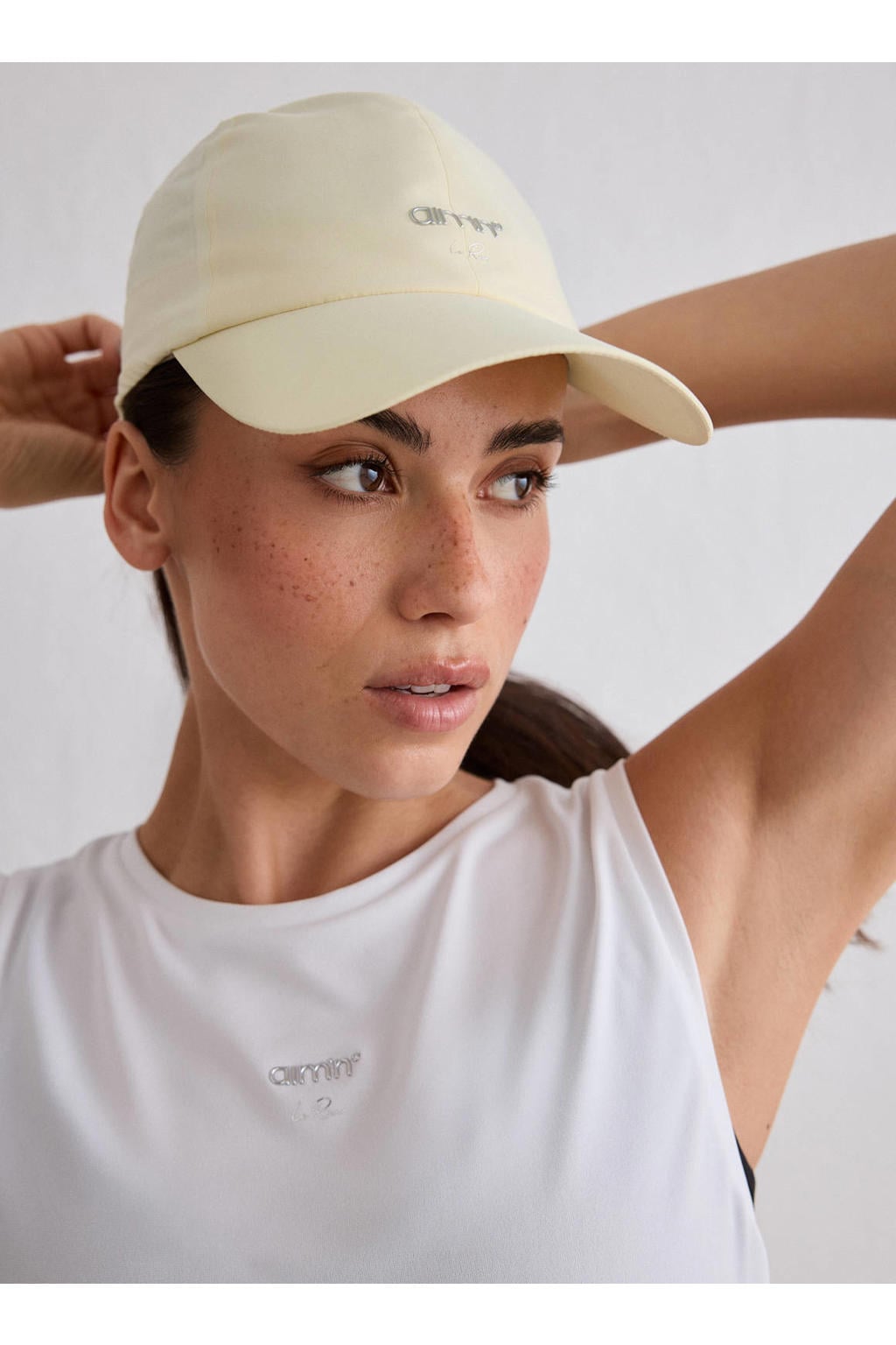 Aim'n Le Run sportpet lichtgeel