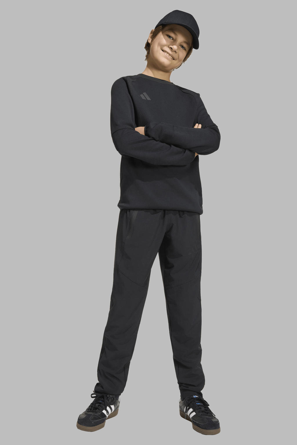 Zwarte jongens en meisjes adidas Performance Junior trainingsbroek Tiro Travel van polyester met regular fit, elastische tailleband met koord en effen