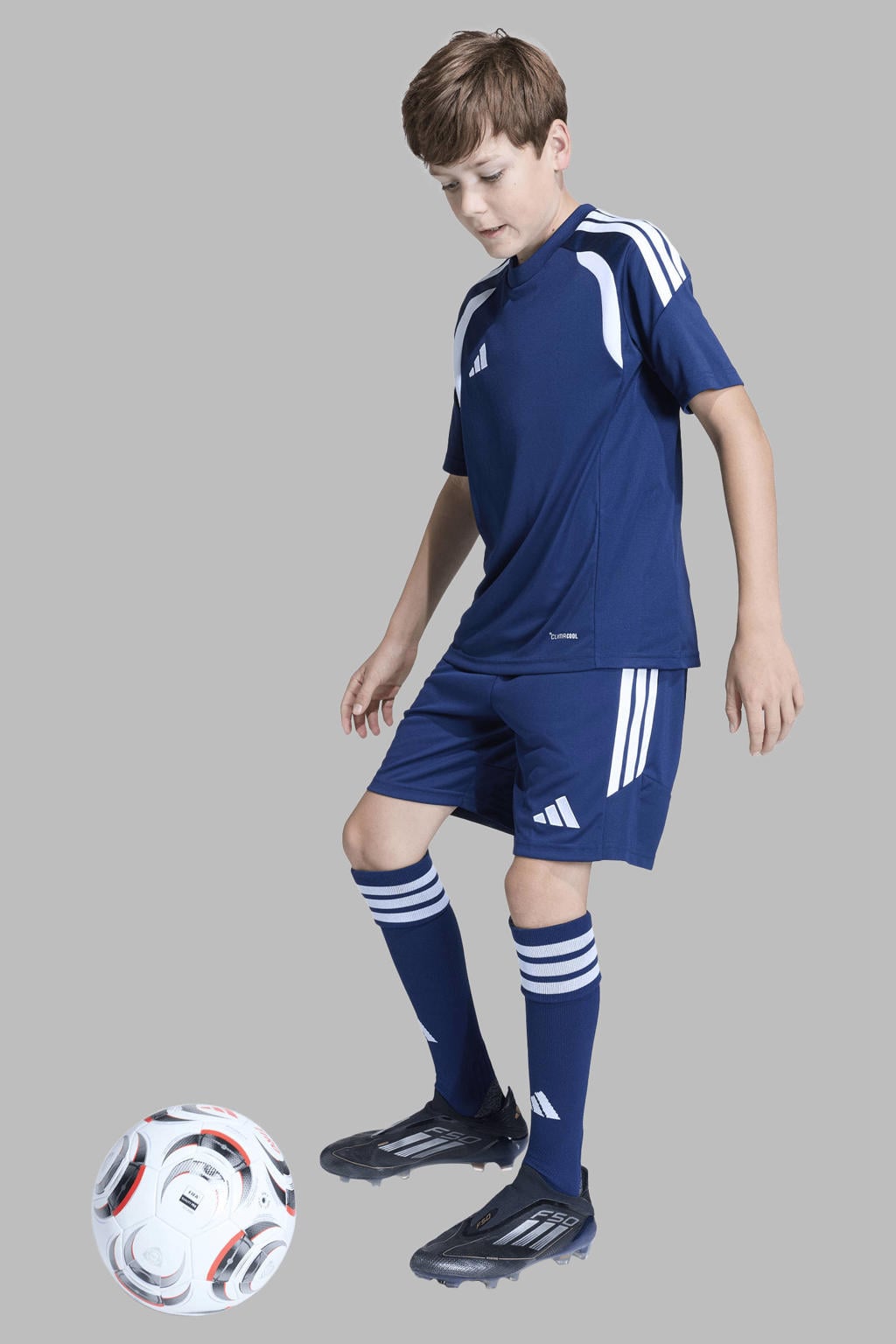 Donkerblauwe jongens en meisjes adidas Performance junior voetbalshirt Tiro26 van polyester met korte mouwen en ronde hals
