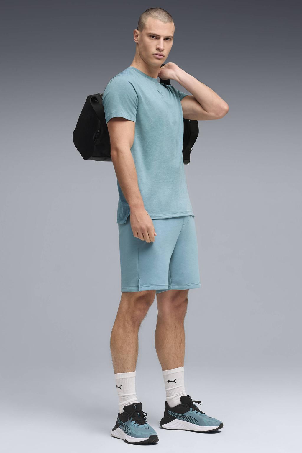 Lichtblauwe heren Puma sportshirt Cloudspun van polyester met korte mouwen en ronde hals
