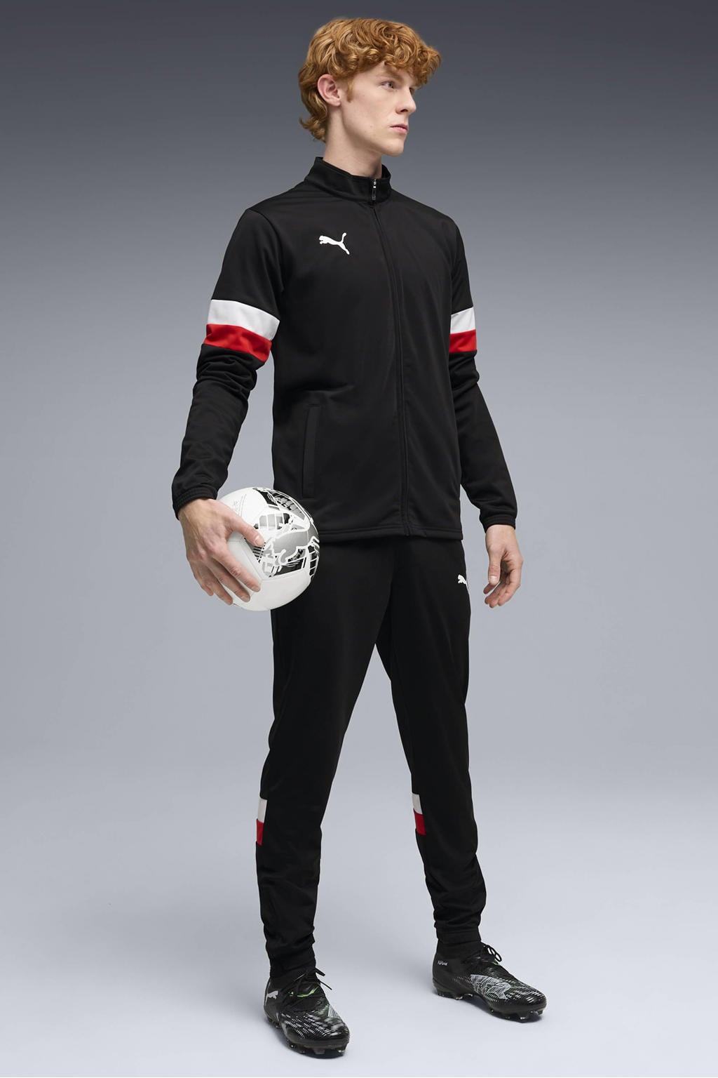 Puma Senior trainingspak zwart/wit/rood
