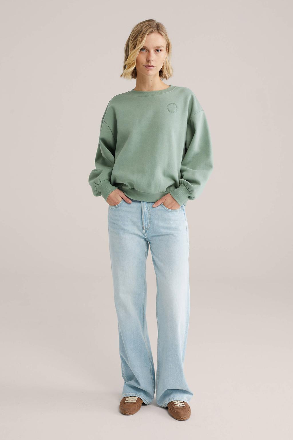 Lichtgroene dames WE Fashion sweater van katoen met tekst print, lange mouwen en ronde hals