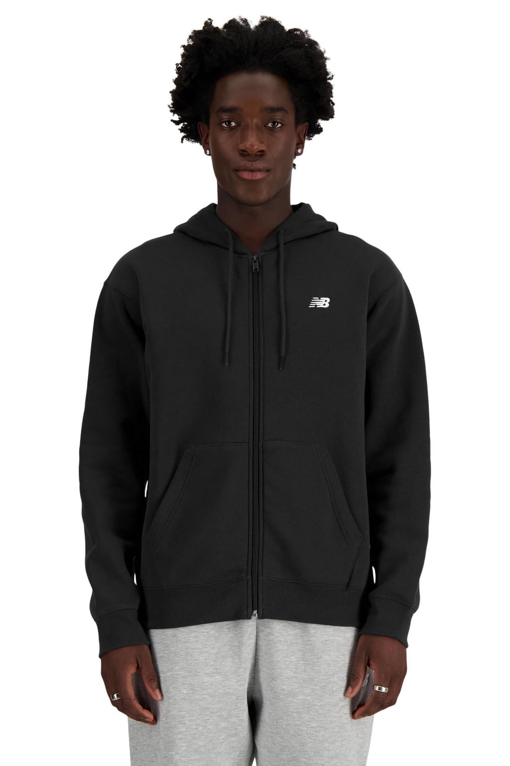 Zwarte heren New Balance sportvest Essentials van sweat materiaal met logo dessin, lange mouwen, capuchon en ritssluiting