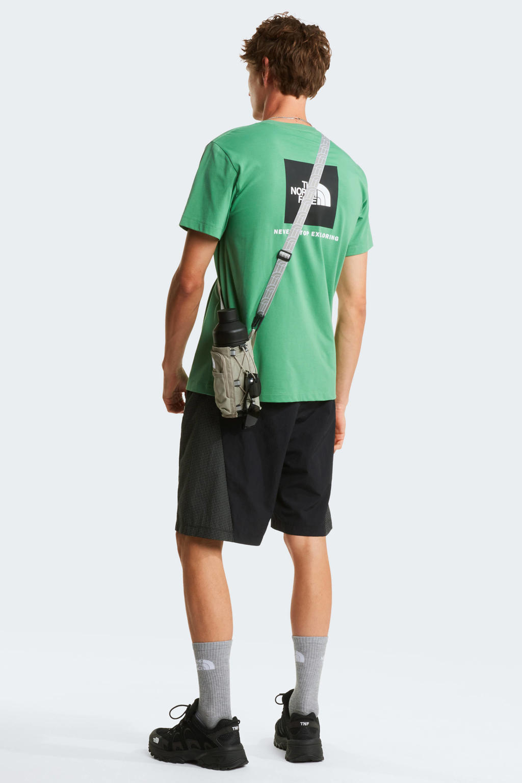 Groene heren The North Face T-shirt Evolution NSE van katoen met logo dessin, korte mouwen en ronde hals