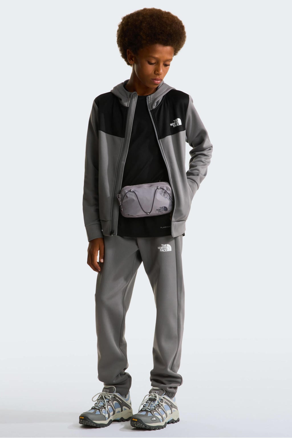 Grijze jongens en meisjes The North Face vest Reaxion van sweat materiaal met meerkleurige print, lange mouwen, opstaande kraag en ritssluiting