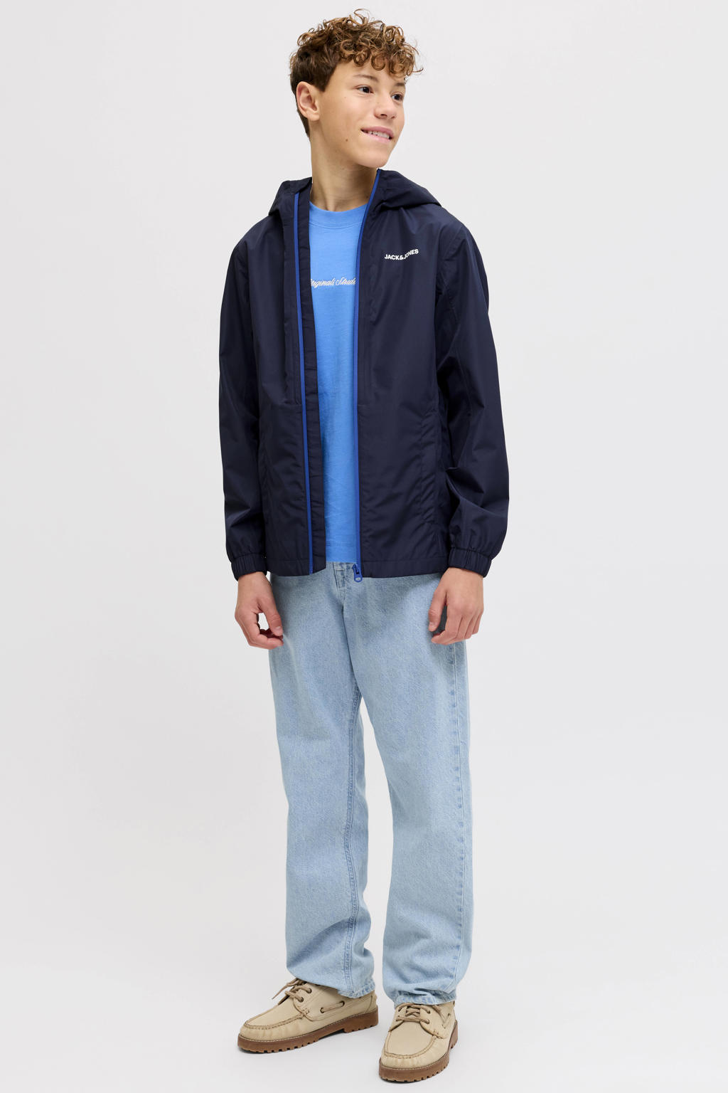 Donkerblauwe jongens JACK & JONES JUNIOR regenjas van polyester met effen, lange mouwen, capuchon en ritssluiting
