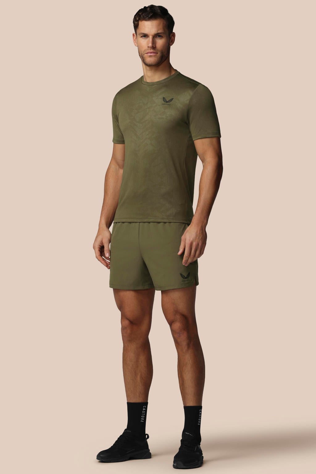 Groen en zwarte heren Castore short van polyester met regular fit en effen