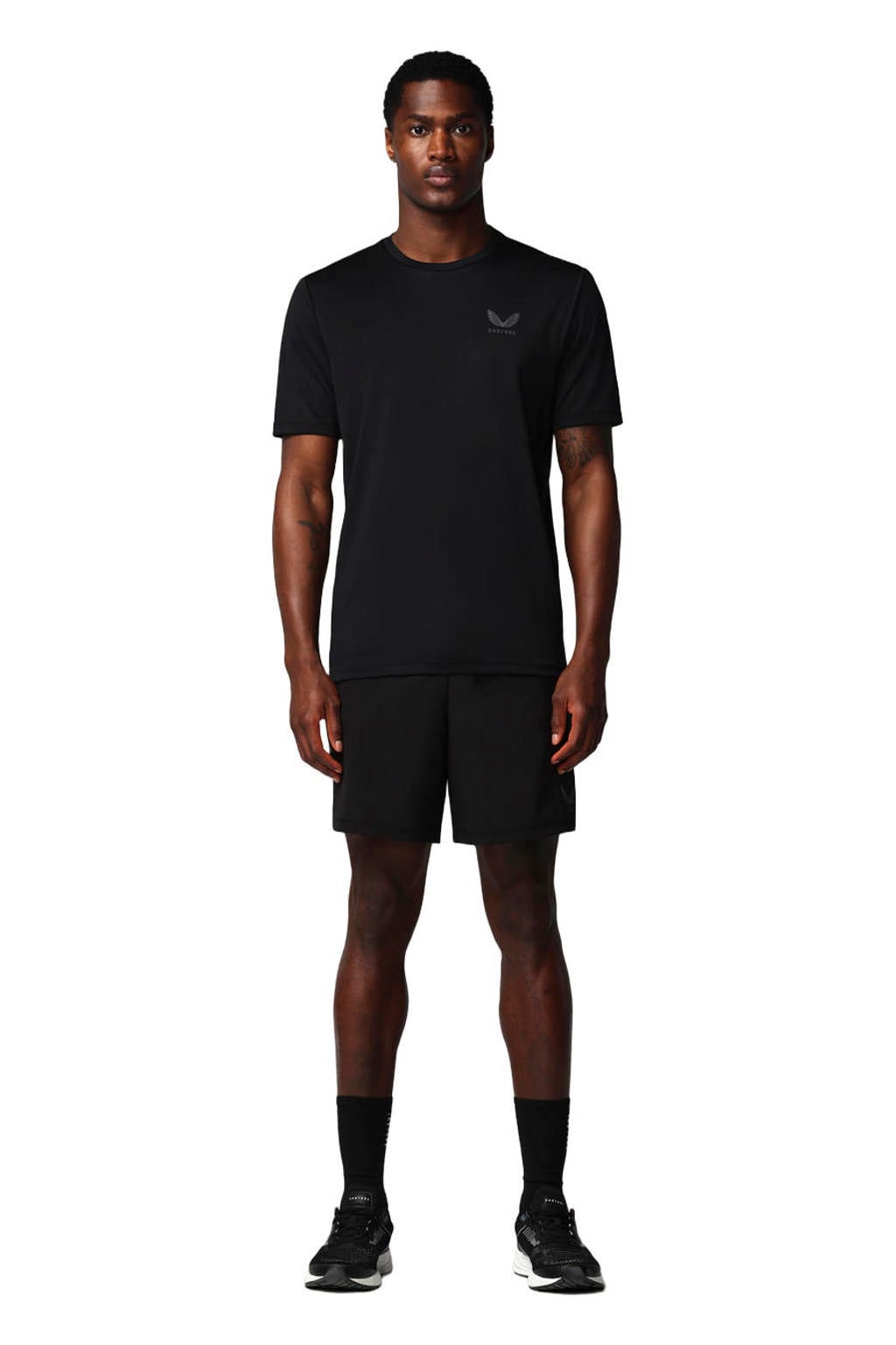 Zwart en grijze heren Castore short van polyester met loose fit en effen