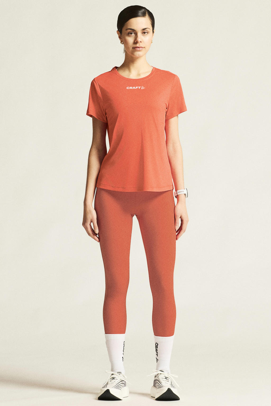 Oranje dames Craft Core Essence hardloopshirt van polyester met effen, korte mouwen en ronde hals