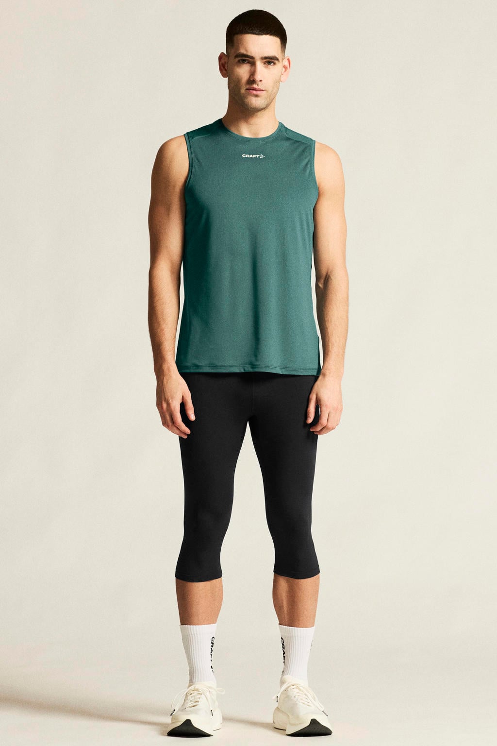 Petrolkleurige heren Craft Essence sportsinglet van polyester met ronde hals