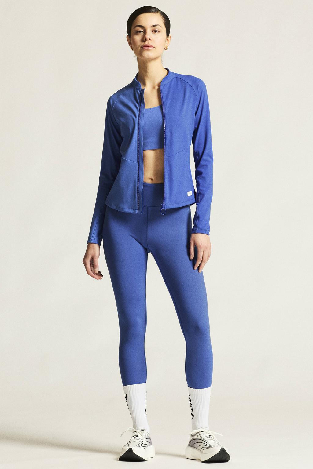 Blauwe dames Craft sportvest Collective van polyester met effen, lange mouwen, ronde hals en ritssluiting