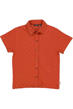 polo oranje met textuur