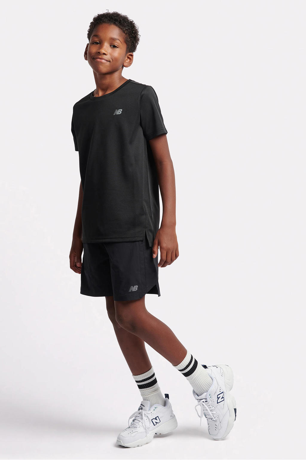 Zwarte jongens en meisjes New Balance sportshirt van polyester met effen, korte mouwen en ronde hals