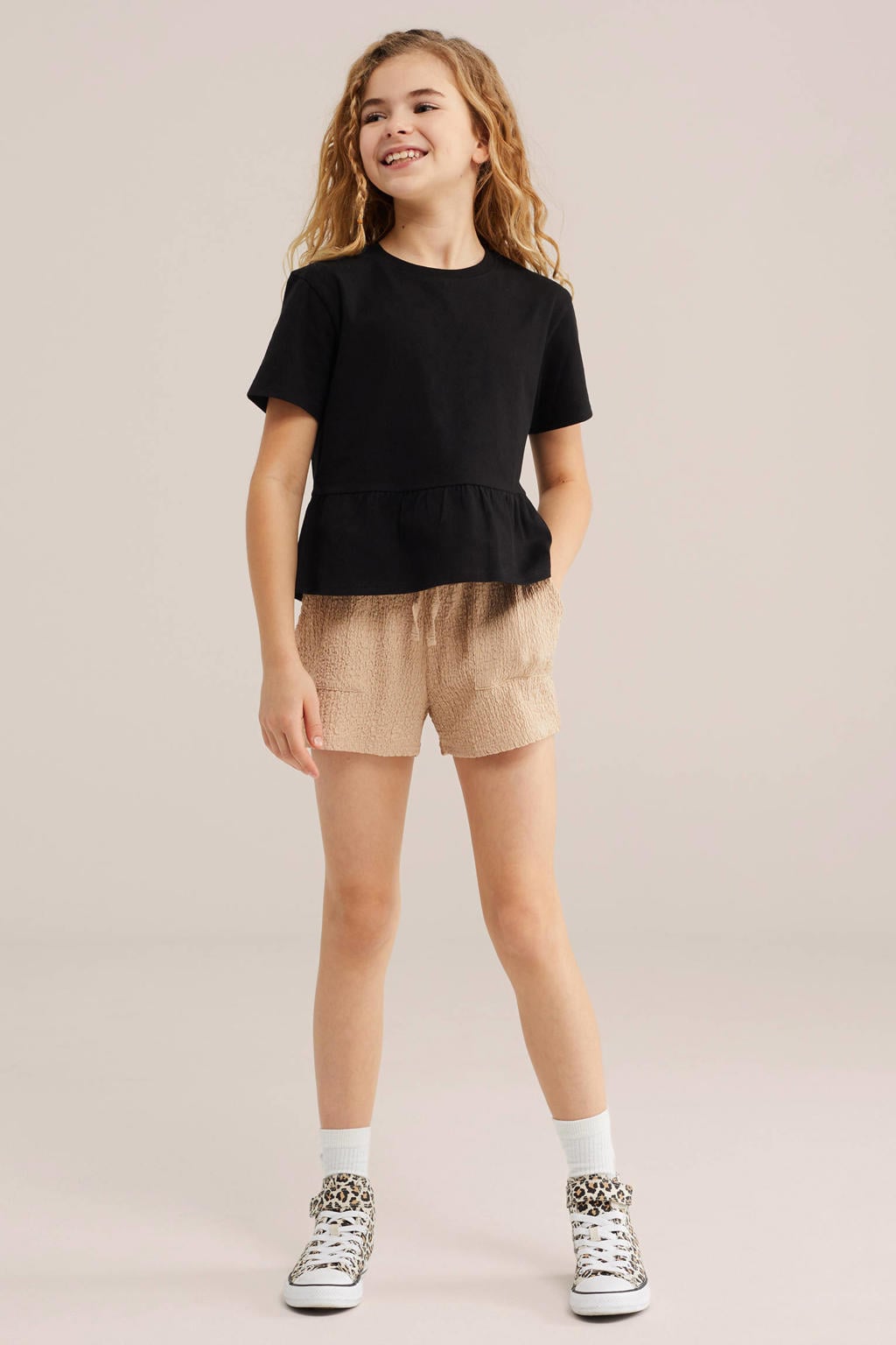 Zwarte meisjes WE Fashion T-shirt van katoen met effen, korte mouwen, ronde hals en peplum