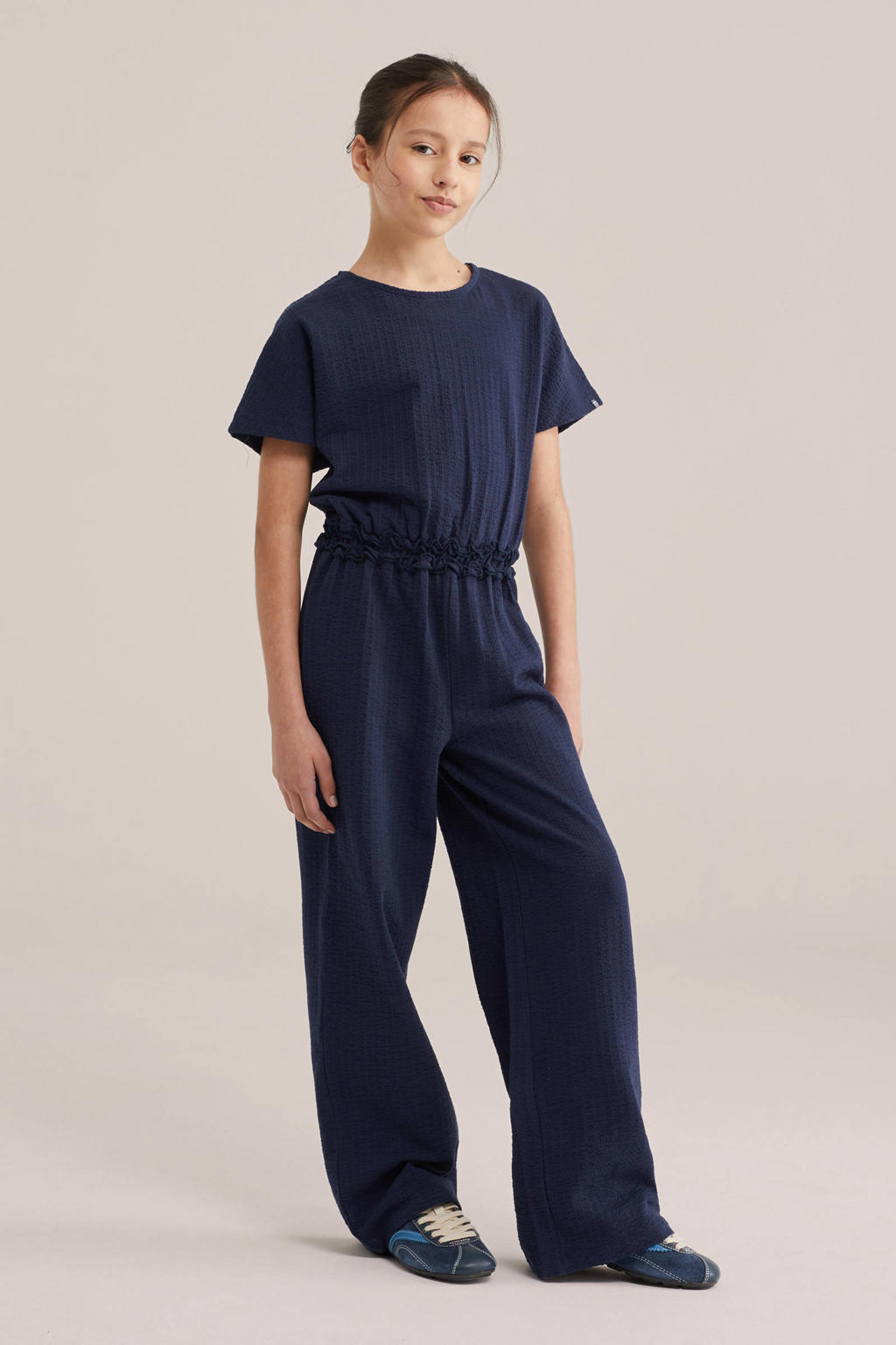 Donkerblauwe meisjes WE Fashion jumpsuit van katoen met effen, korte mouwen, ronde hals, knoopsluiting en elastische boord