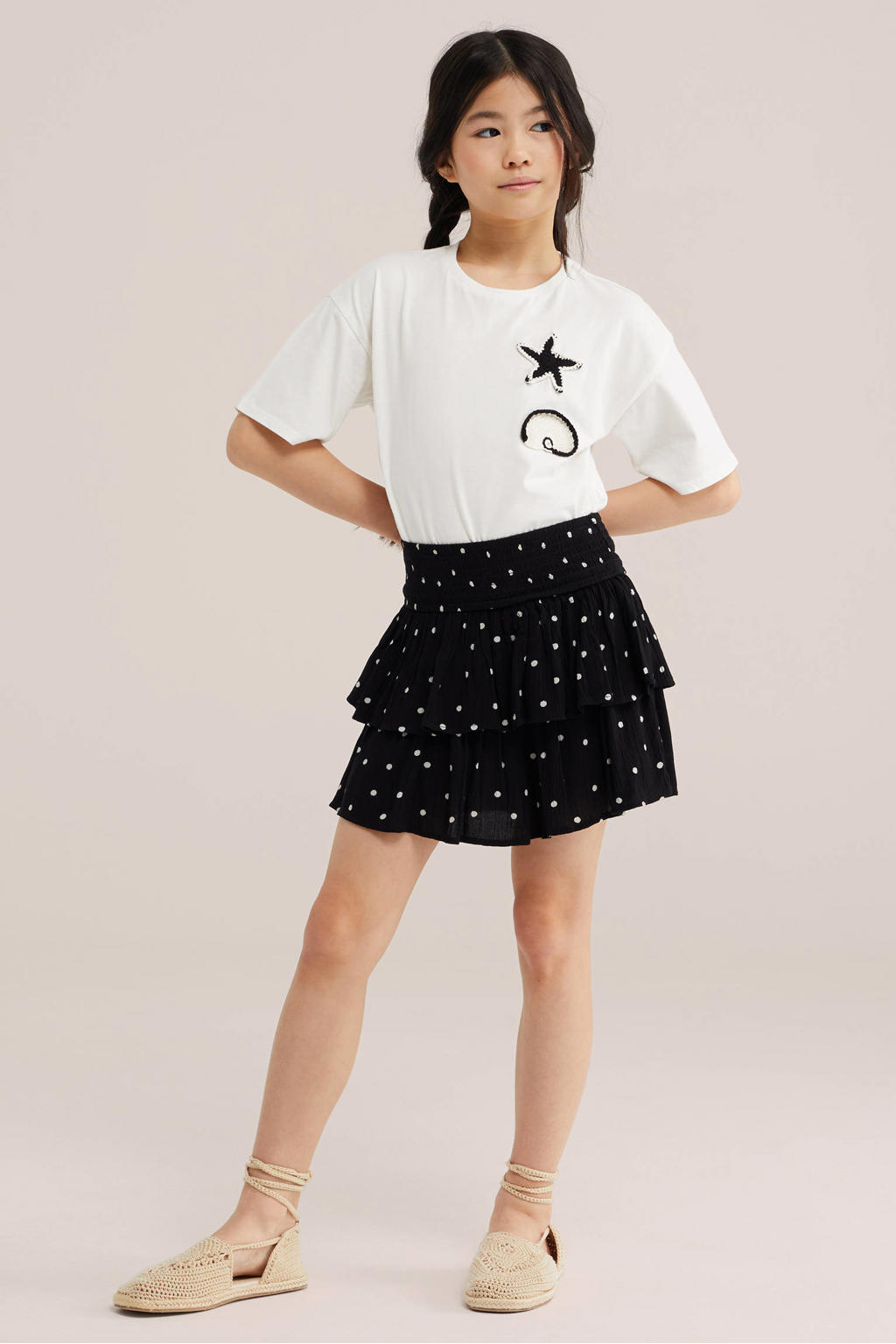 Zwart en witte meisjes WE Fashion A-lijn skort met stippen gemaakt van viscose