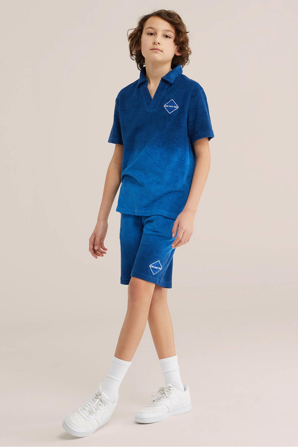 Blauw en donkerblauwe jongens WE Fashion polo van badstof met dip-dye effect, korte mouwen en textuur