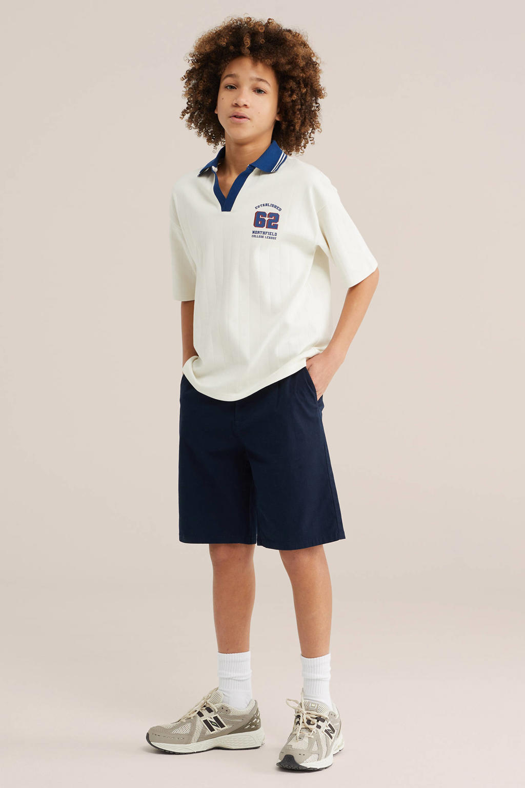 Wit en donkerblauwe jongens WE Fashion polo van katoen met effen en korte mouwen