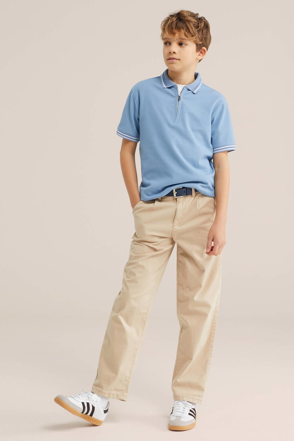 Blauwe jongens WE Fashion polo van katoen met effen, korte mouwen, ritssluiting en contrast bies