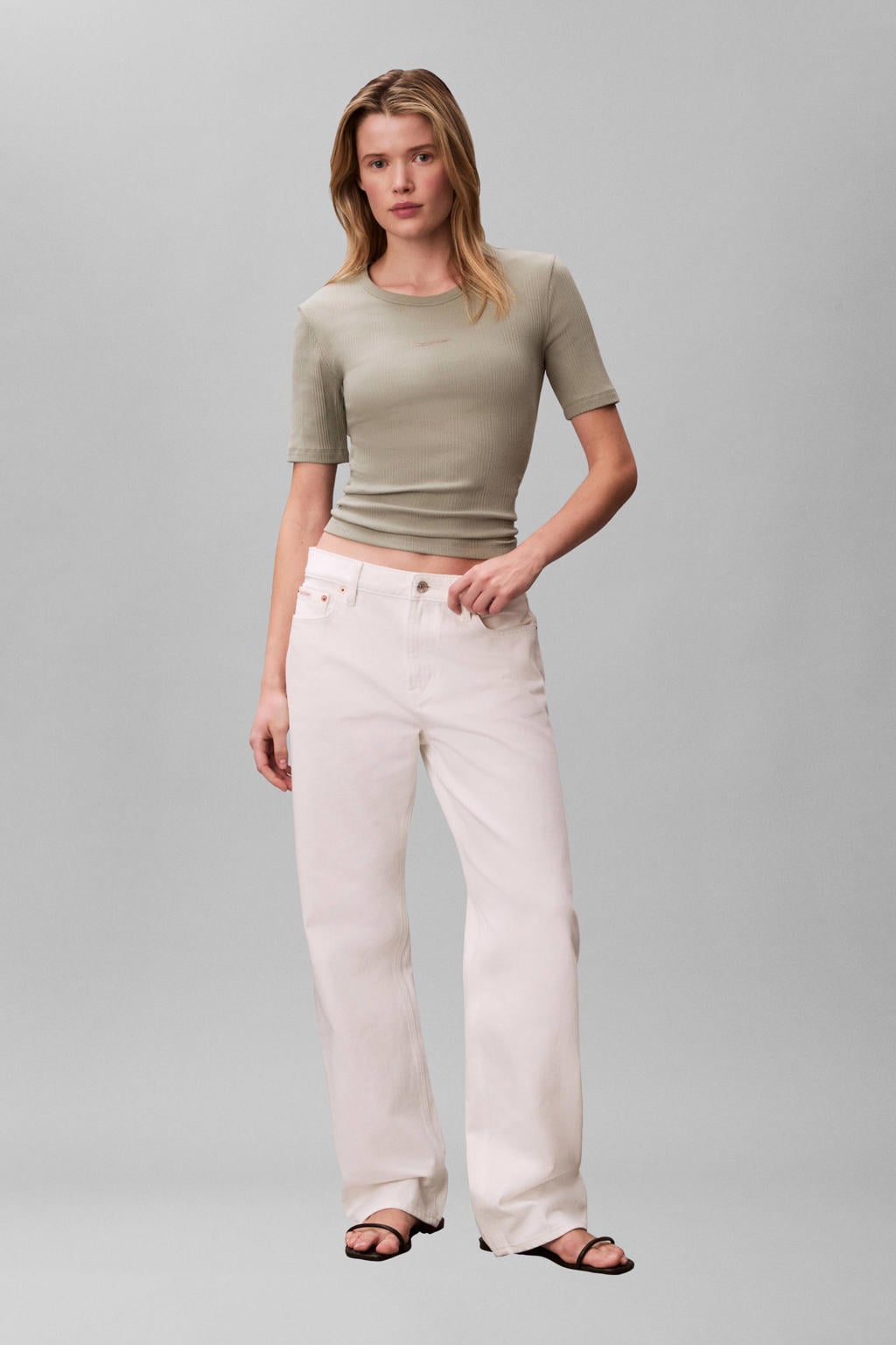 Grijsgroene dames Calvin Klein top groen rib gebreid met logo dessin en korte mouwen