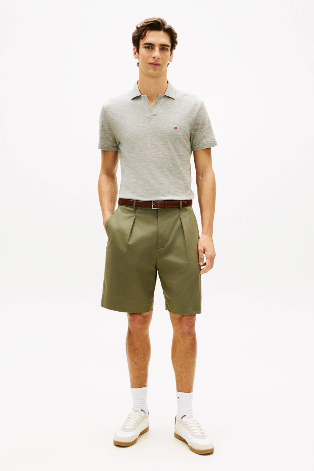 Grijsgroene heren Tommy Hilfiger regular polo groen van katoen met melée print, korte mouwen en pique