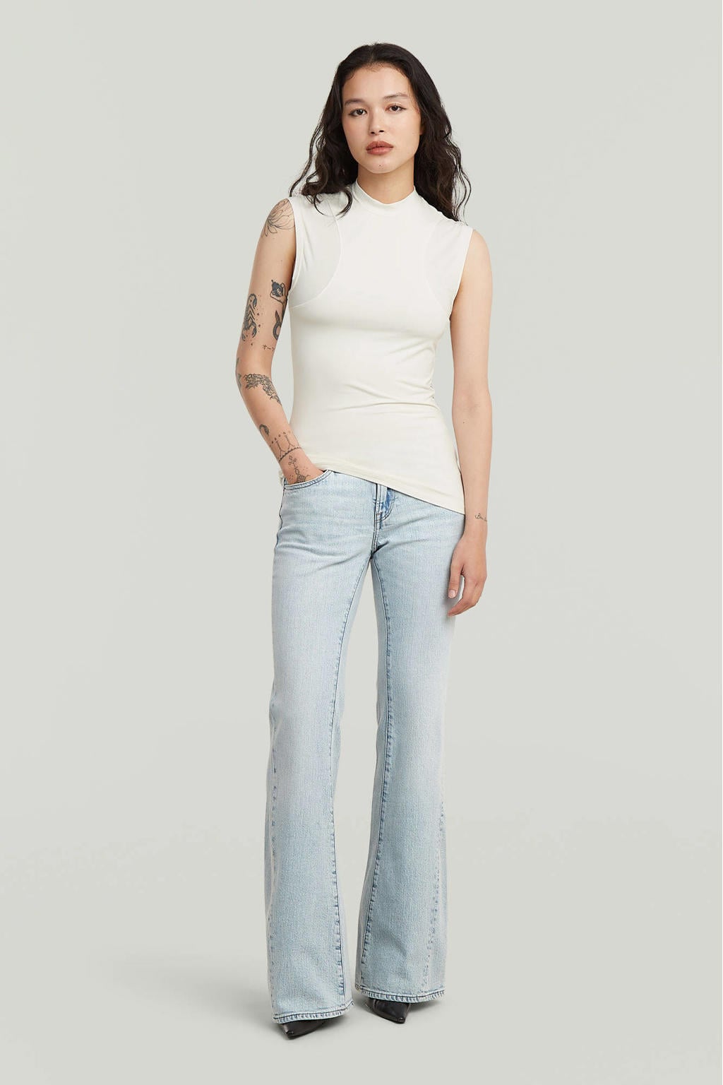 Lichtblauwe dames G-STAR flared jeans van katoen met regular waist, rits- en drukknoopsluiting en effen