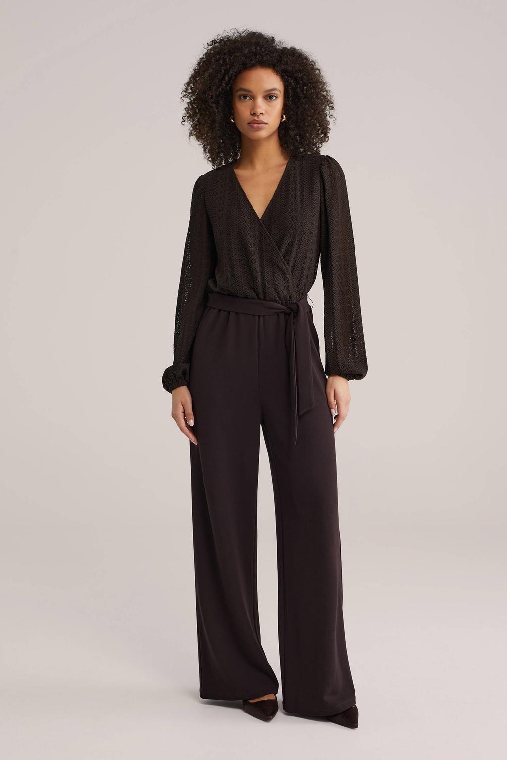 Donkerblauwe dames WE Fashion jumpsuit van polyester met meerkleurige print, lange mouwen en V-hals