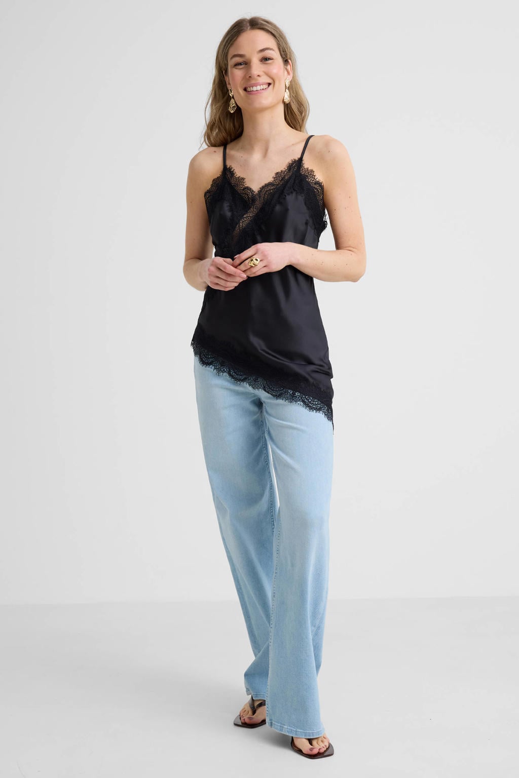 Zwarte dames Anytime satijnen asymmetrische top van polyester met effen, lange mouwen en V-hals
