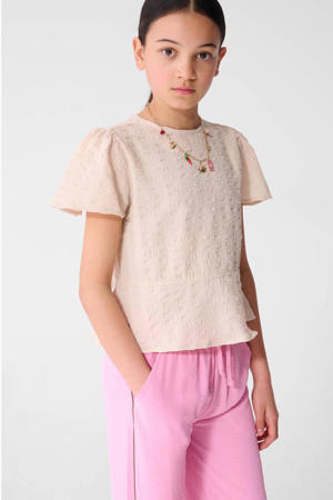 blousetop zand met textuur
