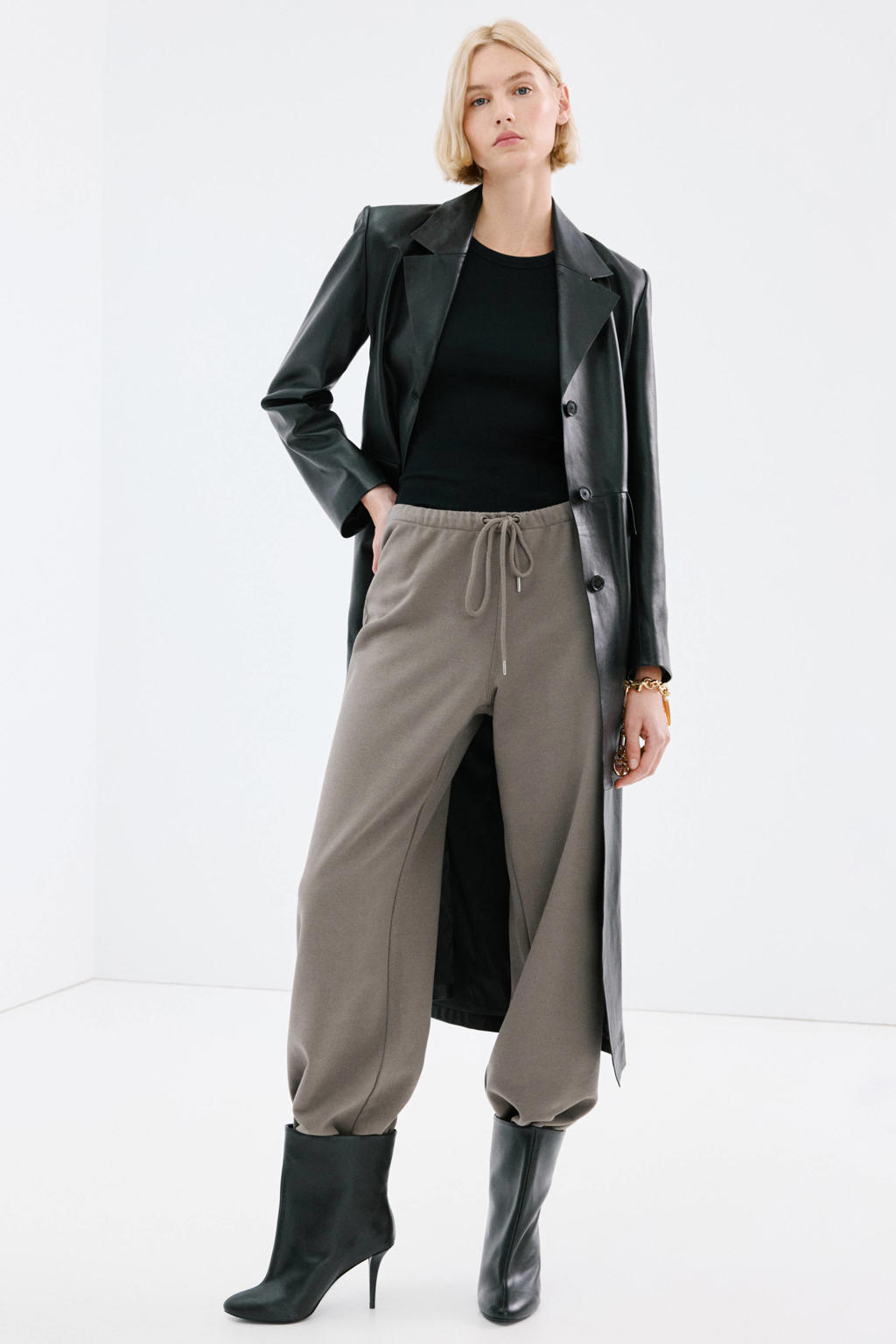 Taupe dames Mango regular waist broek van katoen met loose fit, elastische tailleband met koord en effen