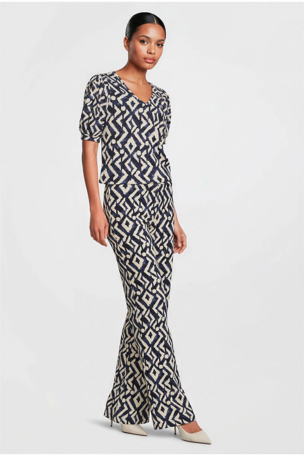 Donkerblauw en ecru dames Dreamstar bootcut high waist broek van polyester met elastische tailleband en grafische print