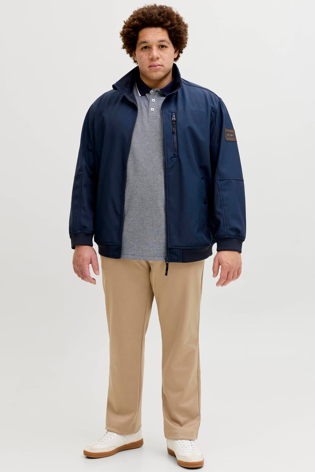 Donkerblauwe heren JACK & JONES PLUS SIZE bomberjack Plus Size van softshell materiaal met effen, lange mouwen, opstaande kraag, ritssluiting en geribde boorden