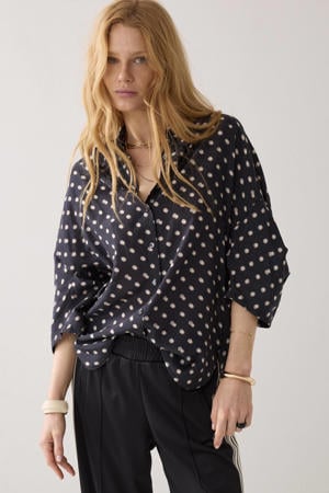 blouse met stippen zwart