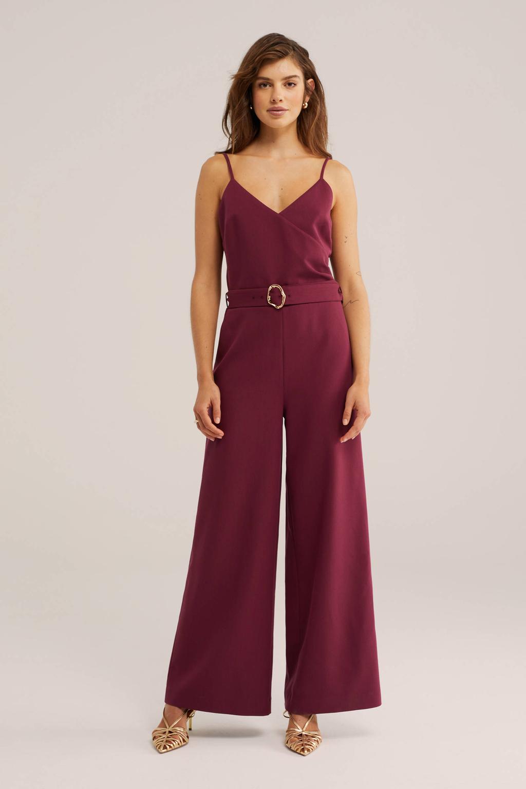 Donkerrode dames WE Fashion jumpsuit van polyester met effen, V-hals, ritssluiting en ceintuur
