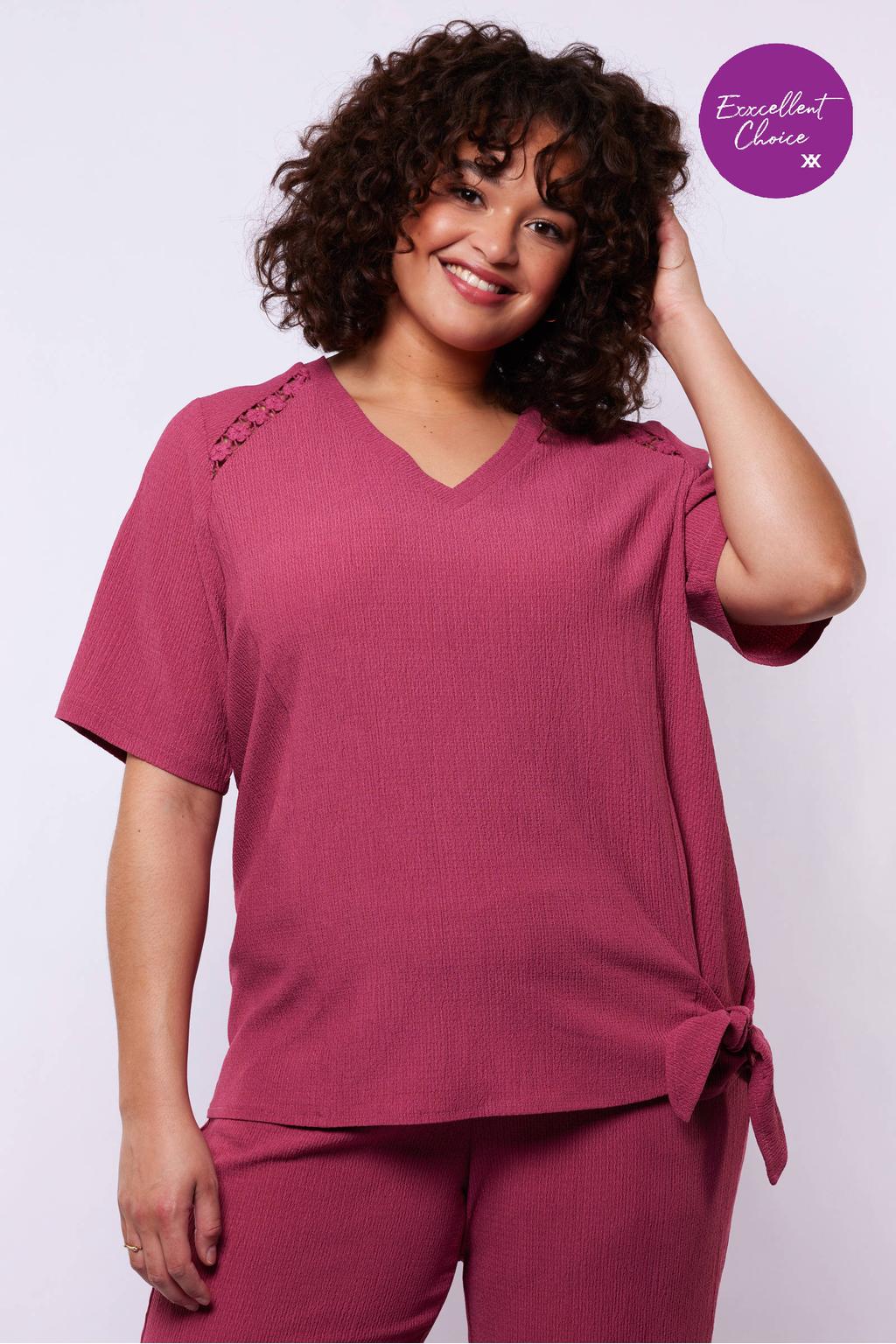 Roze dames Exxcellent top van polyester met effen, korte mouwen en V-hals