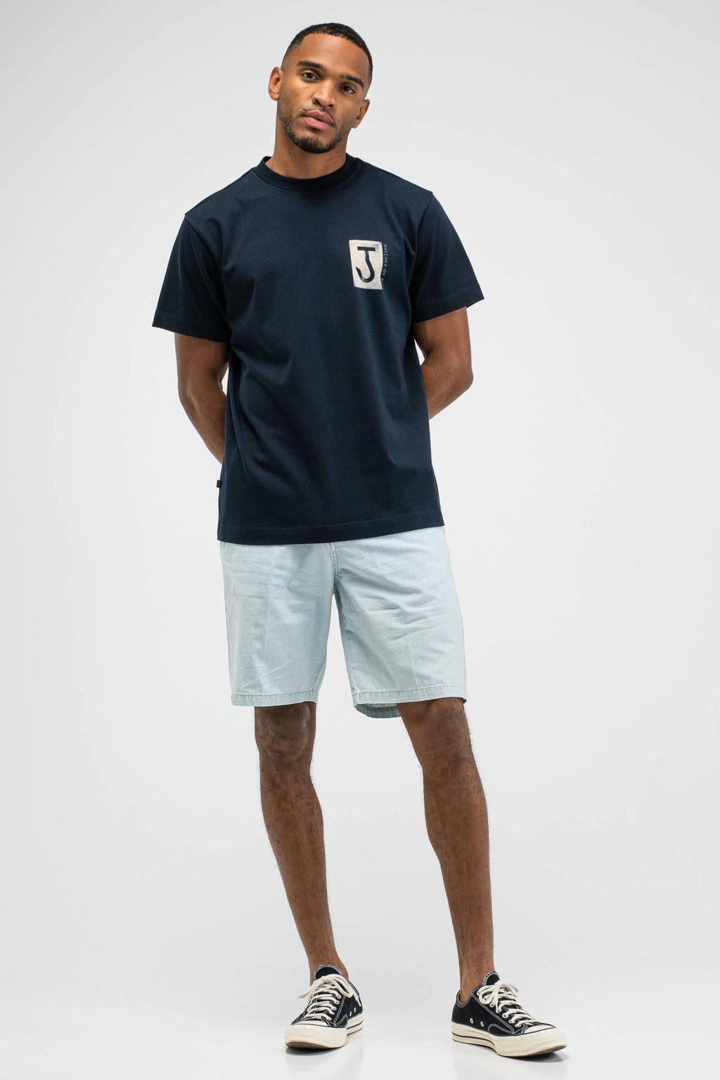 Donkerblauwe heren Butcher of Blue relaxed T-shirt van katoen met backprint, korte mouwen en ronde hals