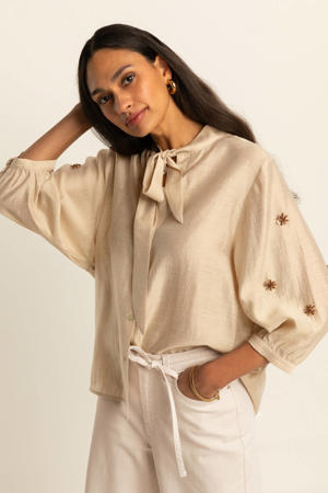 blouse beige met pailletten