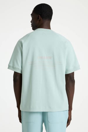 relaxed T-shirt met backprint turquoise