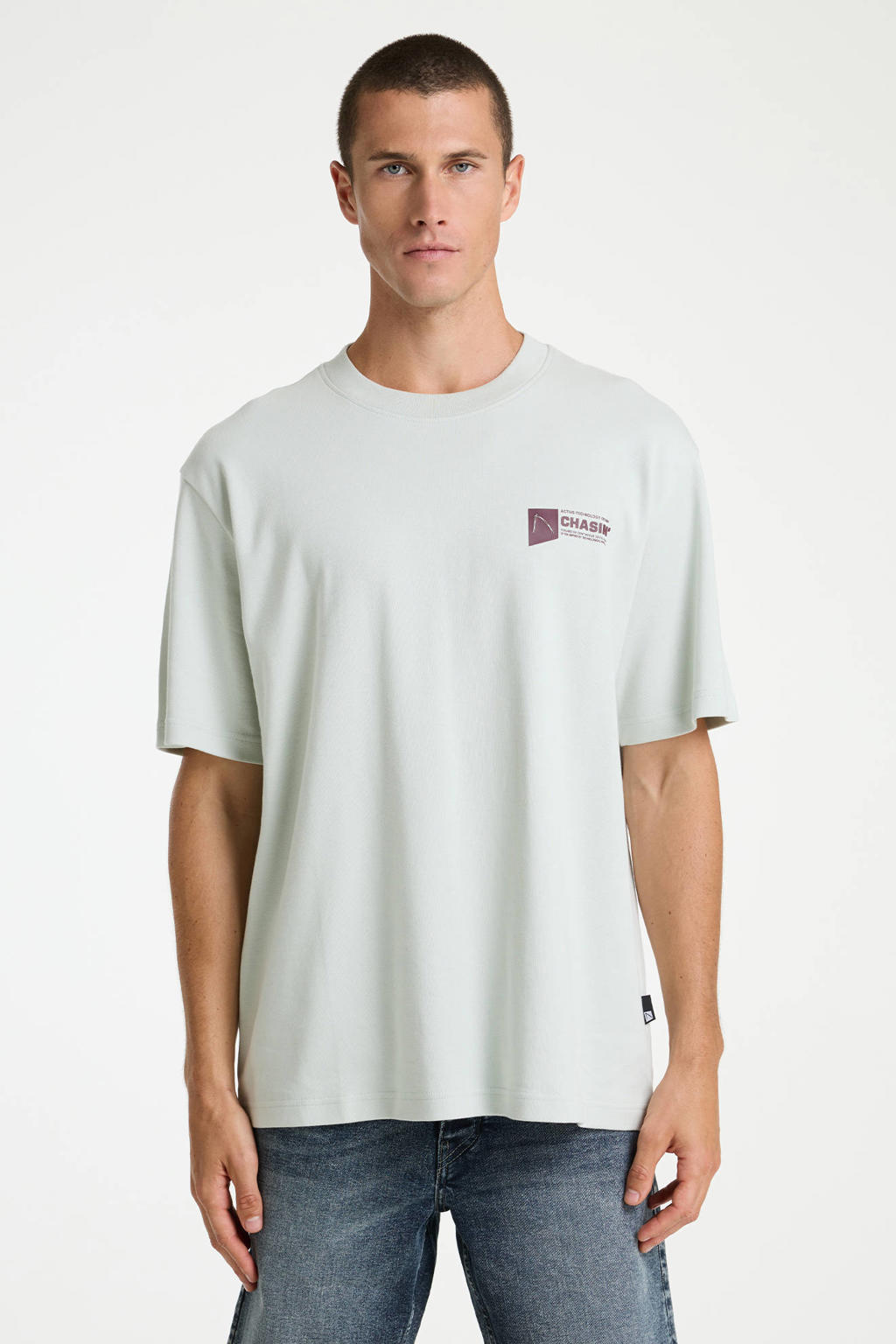 Lichtgroene heren CHASIN' oversized T-shirt van katoen met backprint, korte mouwen en ronde hals
