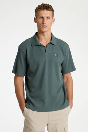 regular polo met textuur groen