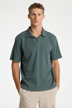 regular polo met textuur groen