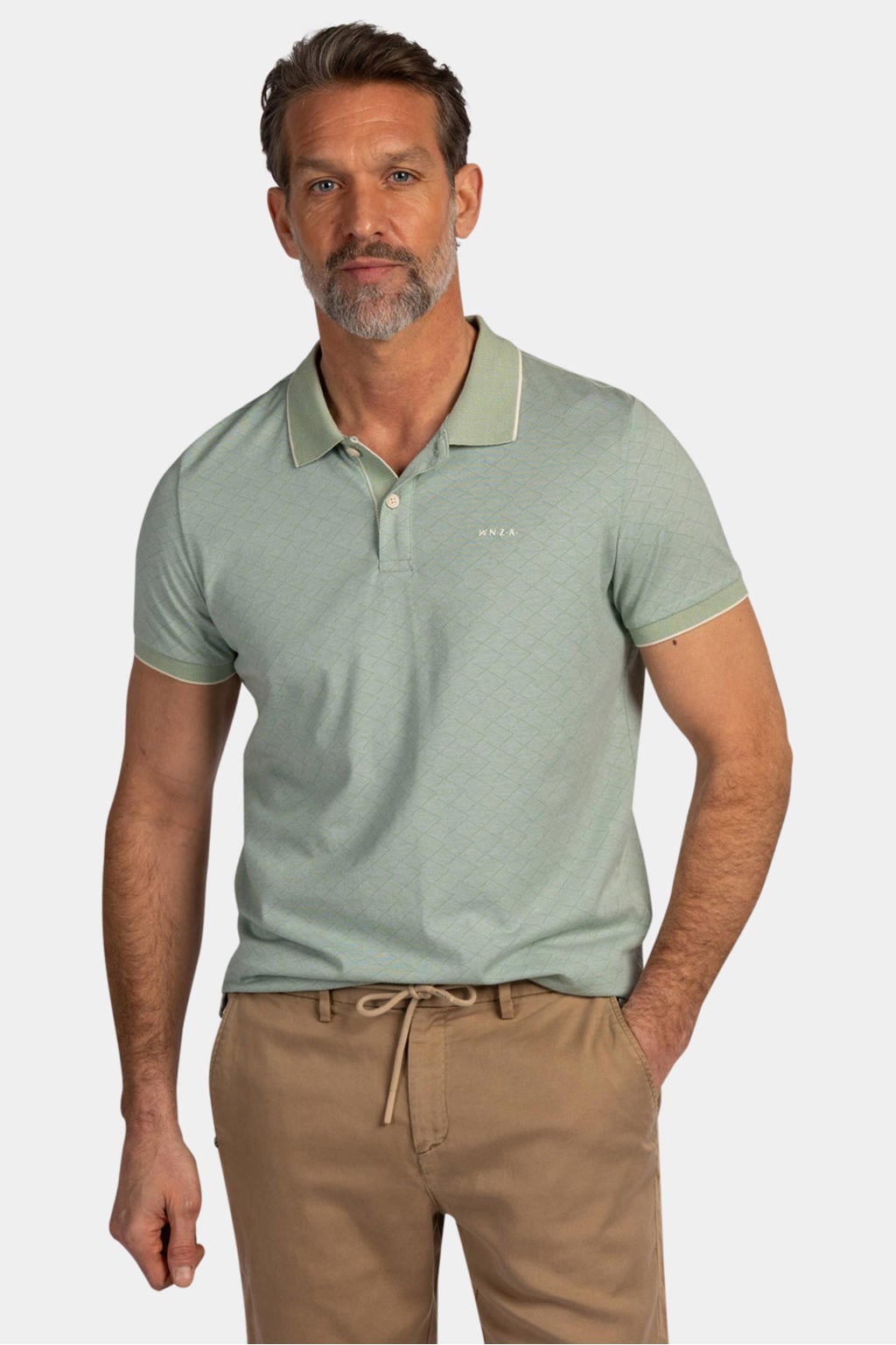 Groene heren New Zealand Auckland regular polo patroon met effen, korte mouwen, knoopsluiting en geribde boorden