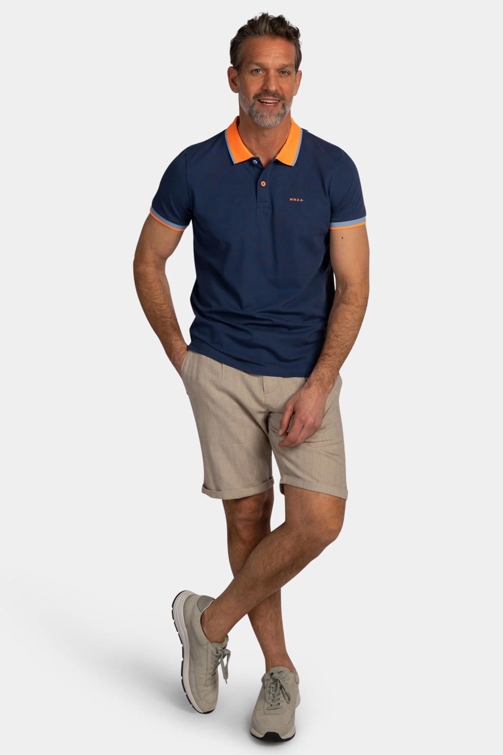 Donkerblauwe heren New Zealand Auckland regular polo van katoen met effen, korte mouwen, knoopsluiting en geribde boorden