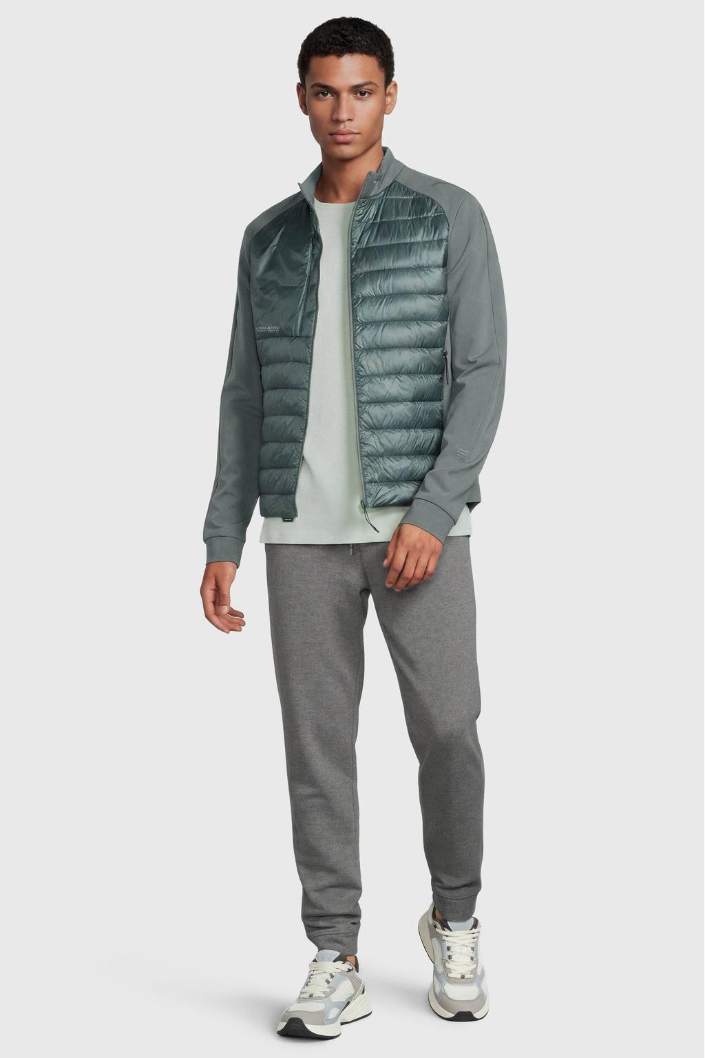 Groene heren KRAKATAU softshell jas van nylon met effen, lange mouwen, opstaande kraag, ritssluiting en doorgestikte details