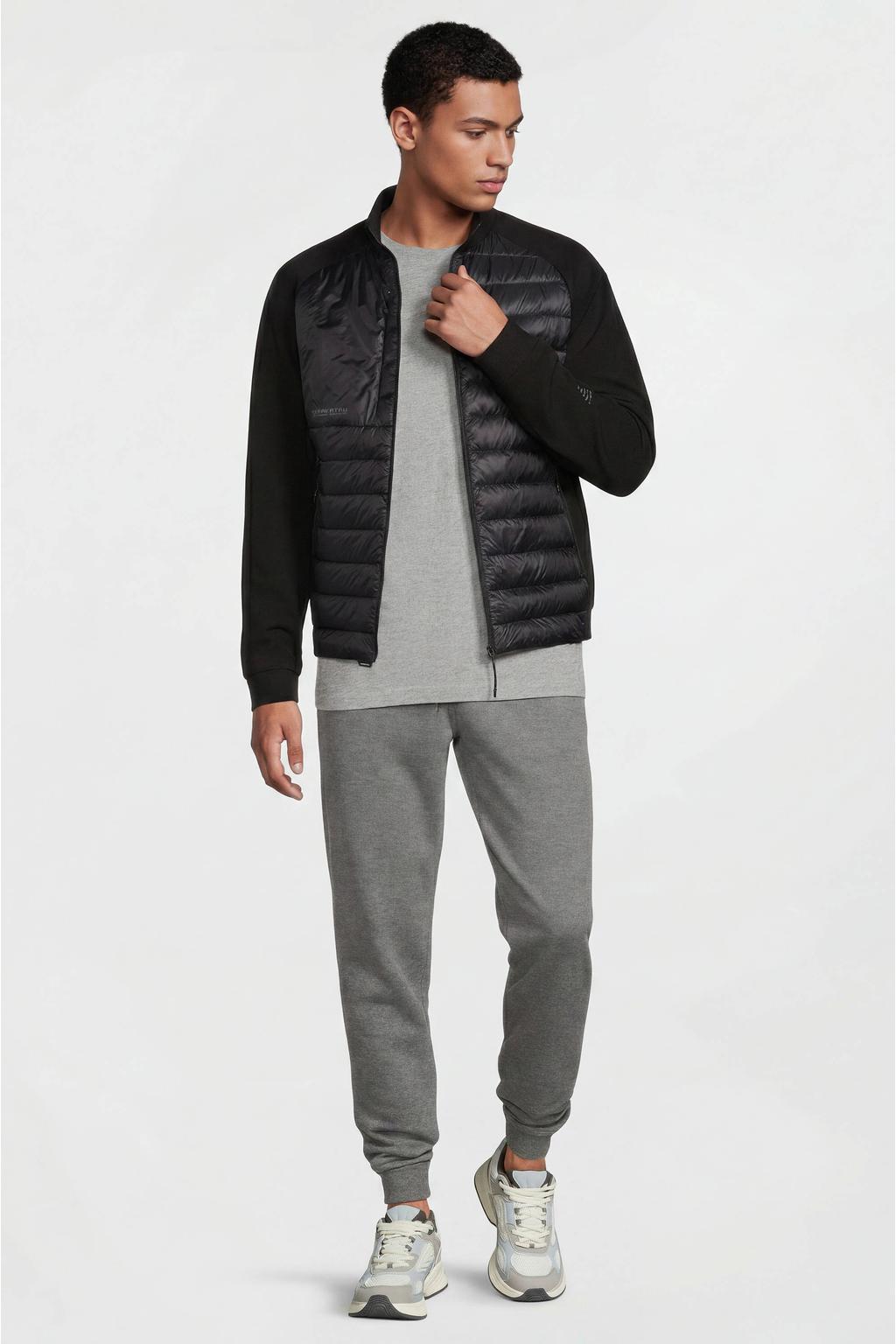 Zwarte heren KRAKATAU softshell jas van nylon met effen, lange mouwen, opstaande kraag, ritssluiting en doorgestikte details