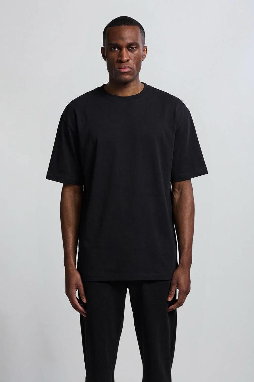 Zwarte heren Vänner relaxed T-shirt van katoen met backprint, korte mouwen en ronde hals