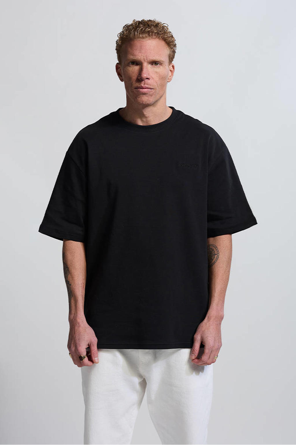 Zwarte heren Vänner relaxed T-shirt van katoen met effen, korte mouwen en ronde hals